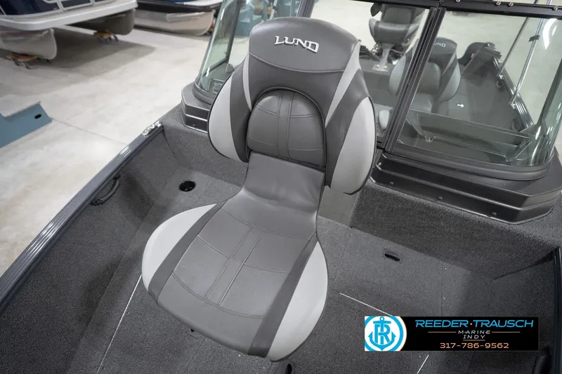 Slide: The Image of 2026 Lund 1650 Rebel XL Sport boat seat in gray and black upholstery. - 43