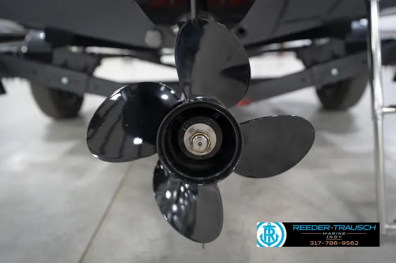 Slide: The Image of Propeller of 2026 Lund 1650 Rebel XL Sport boat on trailer in showroom. - 49