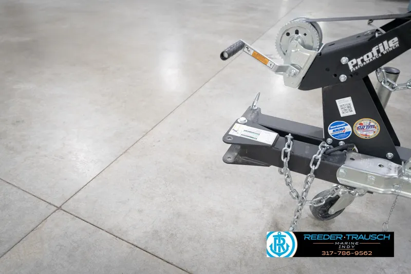 Slide: The Image of Trailer hitch of a 2026 Lund 1650 Rebel XL Sport on a polished concrete floor. - 53