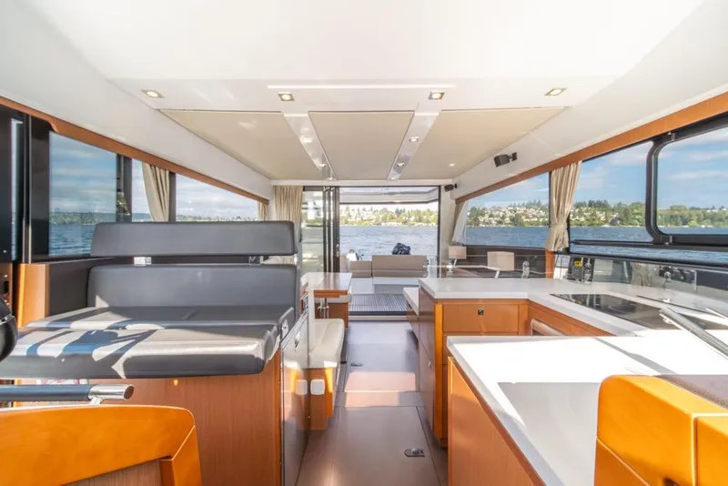 Slide: The Image of Interior of 2016 Jeanneau Velasco 43F yacht with modern design and panoramic windows. - 14