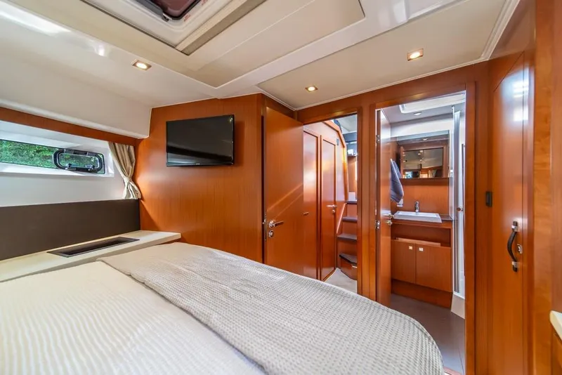 Slide: The Image of Luxurious cabin interior of 2016 Jeanneau Velasco 43F yacht with modern amenities. - 26