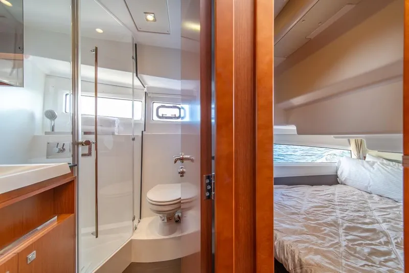 Slide: The Image of Interior of 2016 Jeanneau Velasco 43F yacht showing bathroom and bedroom. - 31