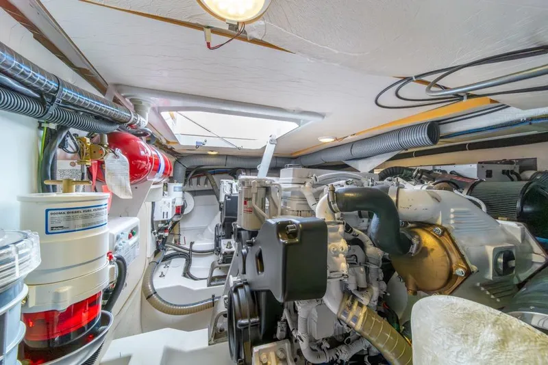 Slide: The Image of Engine room of 2016 Jeanneau Velasco 43F yacht, showcasing mechanical components and systems. - 49