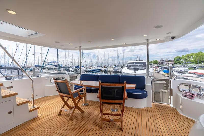 Slide: The Image of Luxurious 2013 Ocean Alexander 72 Pilothouse yacht with elegant deck seating at marina. - 3