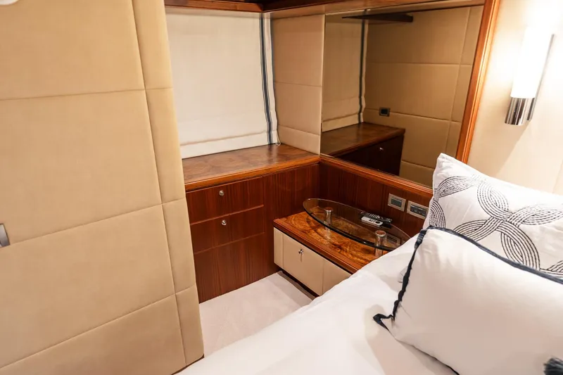 Slide: The Image of Luxurious cabin interior of 2013 Ocean Alexander 72 Pilothouse yacht with elegant wood finish. - 30
