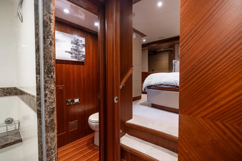 Slide: The Image of Luxurious interior of 2013 Ocean Alexander 72 Pilothouse yacht with wood finishes and modern amenities. - 31