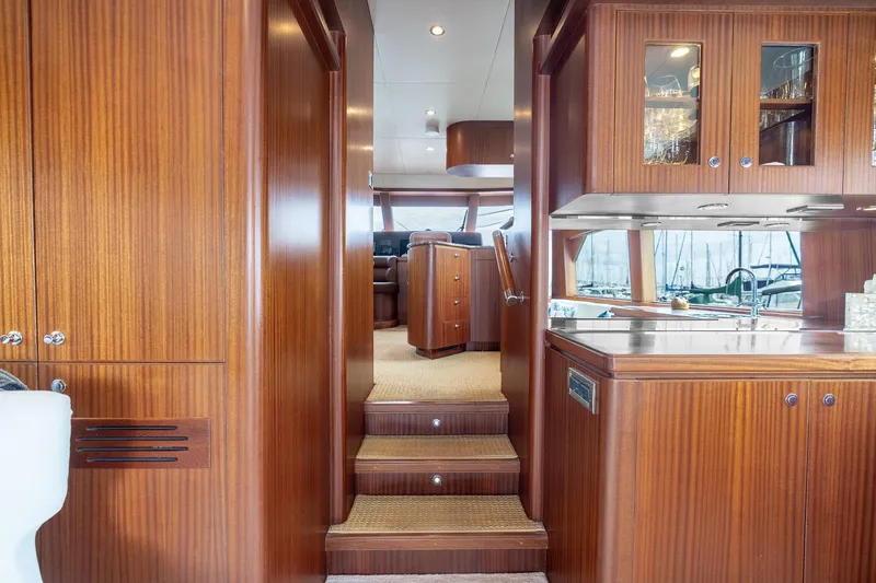 Slide: The Image of Luxurious interior of 2013 Ocean Alexander 72 Pilothouse yacht with wood finishes and modern amenities. - 34