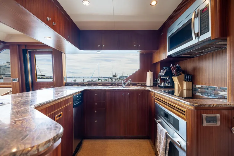 Slide: The Image of Luxurious kitchen interior of 2013 Ocean Alexander 72 Pilothouse yacht with modern appliances. - 36