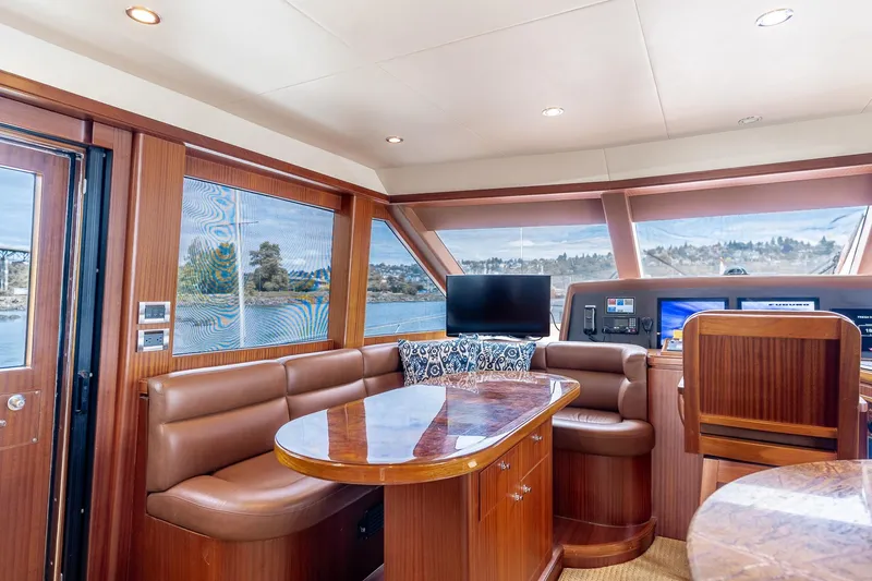 Slide: The Image of Luxurious interior of 2013 Ocean Alexander 72 Pilothouse yacht with leather seating and wood finishes. - 37
