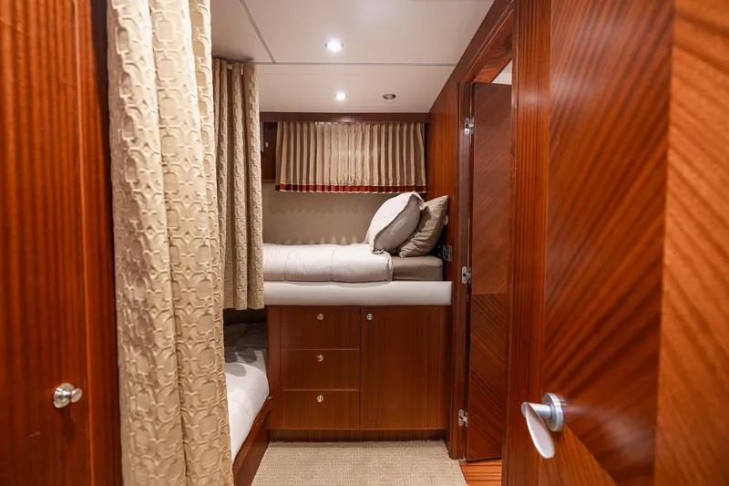 Slide: The Image of Luxurious cabin interior of 2013 Ocean Alexander 72 Pilothouse yacht with wood finish. - 44