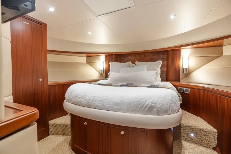 Slide: The Image of Luxurious bedroom interior of 2013 Ocean Alexander 72 Pilothouse yacht with elegant wood finishes. - 48