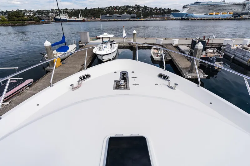 Slide: The Image of Bow view of 2013 Ocean Alexander 72 Pilothouse docked at marina. - 53