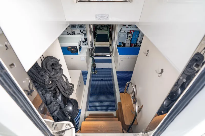Slide: The Image of Engine room of 2013 Ocean Alexander 72 Pilothouse yacht, featuring organized equipment and storage. - 56