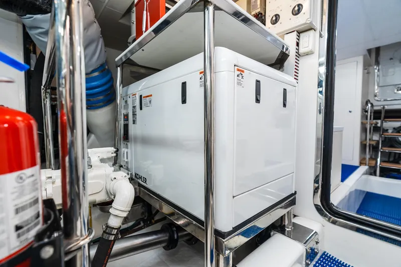 Slide: The Image of Engine room of 2013 Ocean Alexander 72 Pilothouse yacht with Kohler generator. - 64