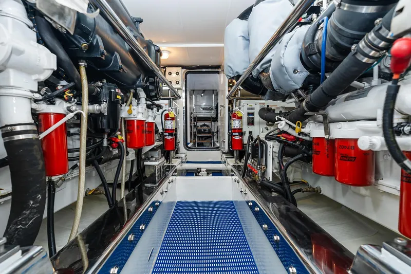 Slide: The Image of Engine room of 2013 Ocean Alexander 72 Pilothouse yacht, featuring advanced machinery and equipment. - 68