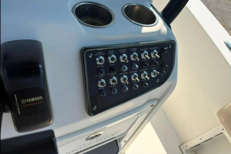Slide: The Image of Control panel of a 2016 NauticStar 2102 Legacy boat with Yamaha remote. - 9