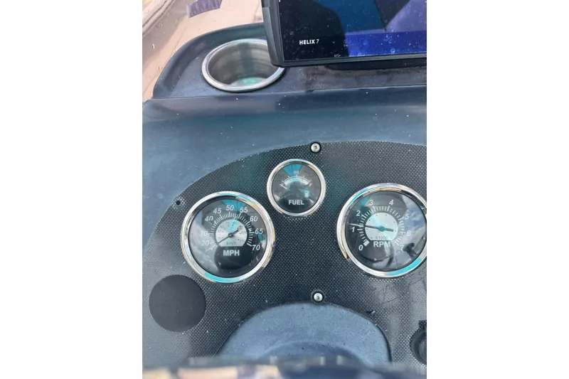 Slide: The Image of Dashboard of 2020 Excel 203 Bay Pro boat with speedometer, fuel, and RPM gauges. - 19