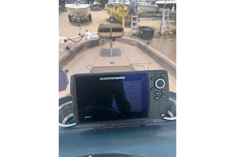 Slide: The Image of 2020 Excel 203 Bay Pro boat with Humminbird Helix 7 fish finder on console. - 20