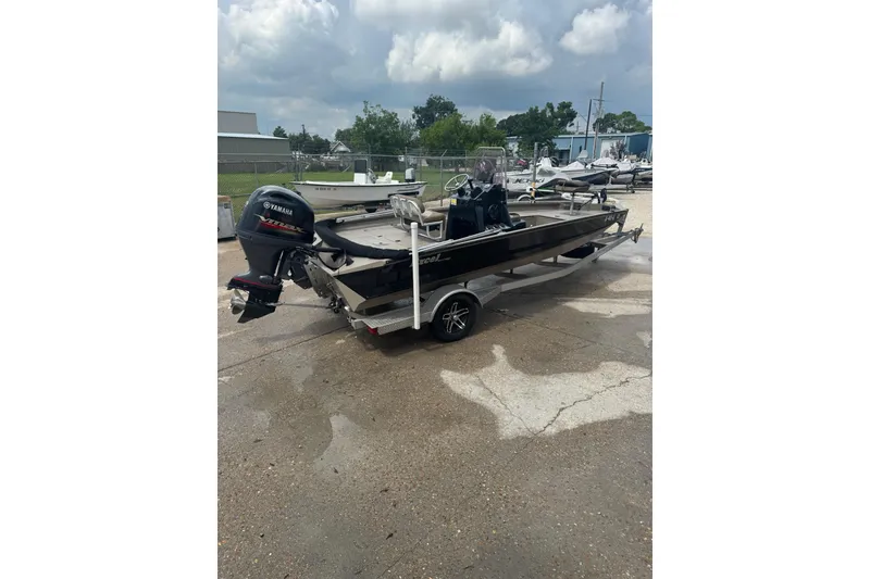 Slide: The Image of 2020 Excel 203 Bay Pro boat with Yamaha outboard motor on trailer. - 4
