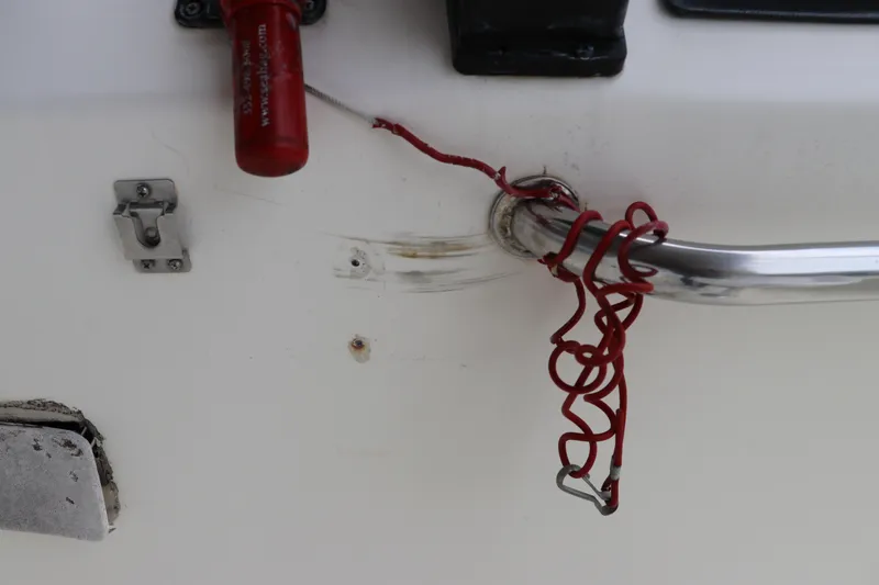 Slide: The Image of Close-up of a 2004 Pioneer 175 Bay Sport boat's safety lanyard and hardware. - 22