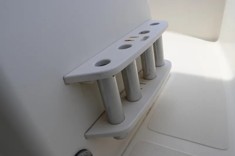 Slide: The Image of Rod holder on 2004 Pioneer 175 Bay Sport boat, featuring four slots. - 25