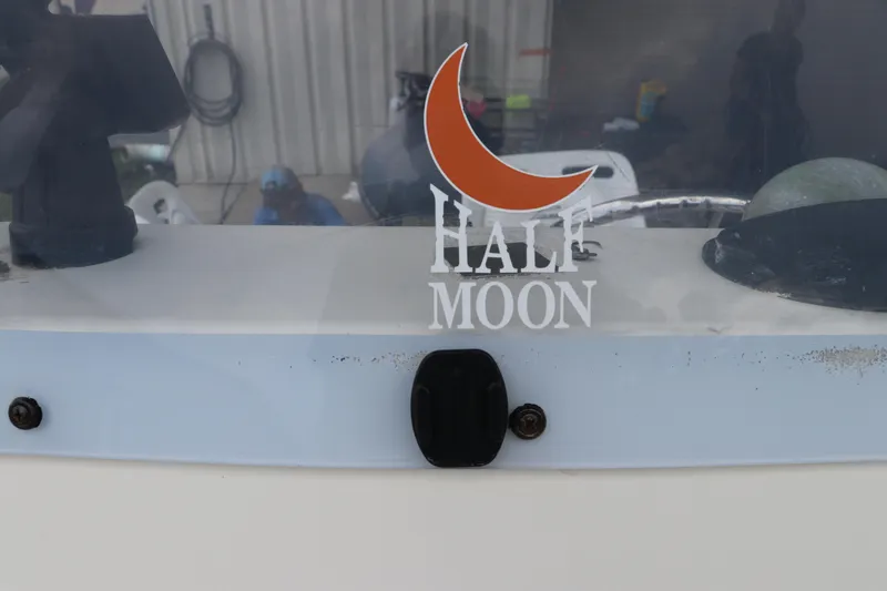 Slide: The Image of 2004 Pioneer 175 Bay Sport boat with "Half Moon" decal on windshield. - 31
