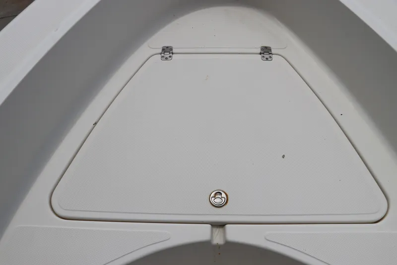 Slide: The Image of 2004 Pioneer 175 Bay Sport boat storage compartment with latch, top view. - 35