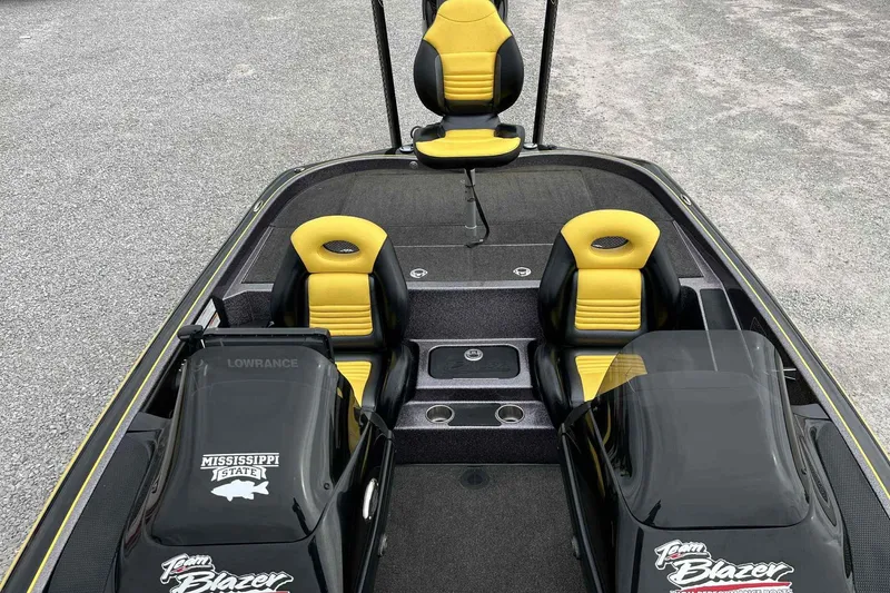 Slide: The Image of 2017 Blazer 625 Pro Elite boat interior with yellow and black seats, featuring Lowrance equipment. - 12