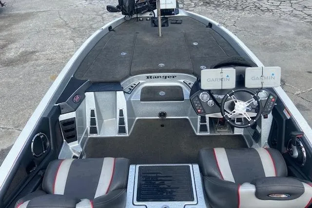 Slide: The Image of 2014 Ranger 520C boat interior with Garmin navigation system and dual seating. - 4