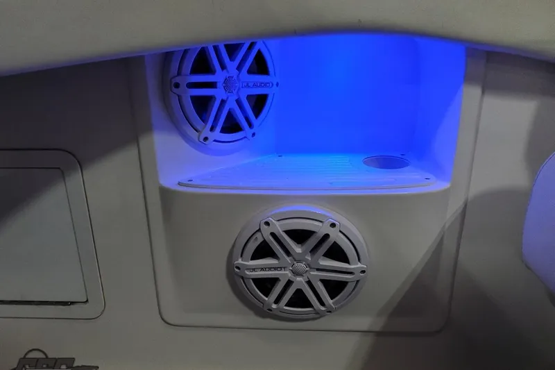 Slide: The Image of Interior of 2001 Hustler 50 Monster boat with illuminated JL Audio speakers. - 19