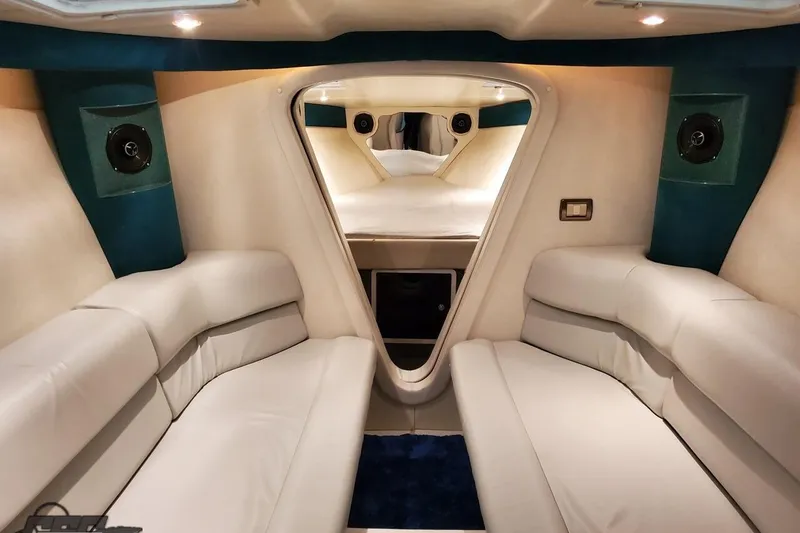 Slide: The Image of Luxurious interior of a 2001 Hustler 50 Monster boat with plush seating and modern design. - 29