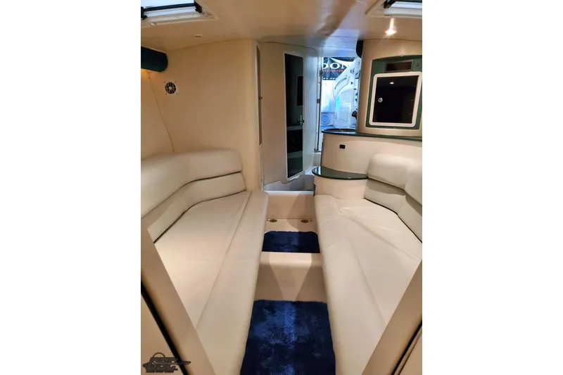 Slide: The Image of Luxurious interior of a 2001 Hustler 50 Monster boat with plush seating and modern design. - 30