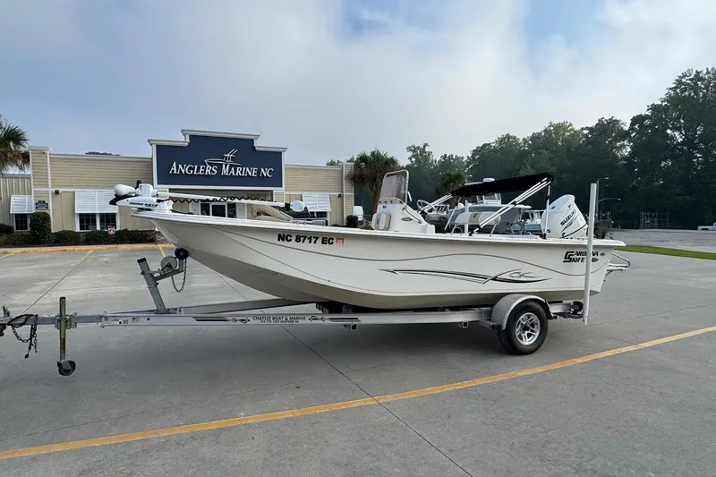 The Image of 2016 Carolina Skiff 218 DLV boat on trailer at Anglers Marine NC. - 0