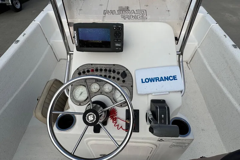 Slide: The Image of 2016 Carolina Skiff 218 DLV boat console with Lowrance navigation system. - 13