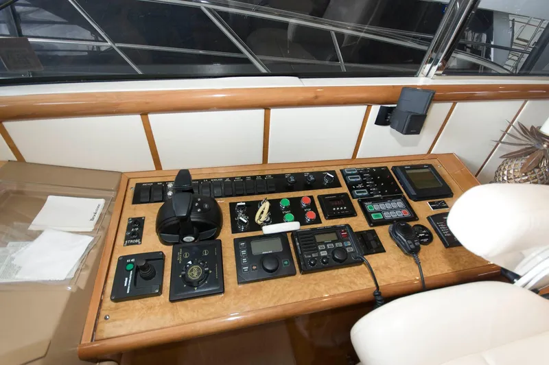 Slide: The Image of Control panel of a 2001 Neptunus 56 Express yacht with navigation instruments. - 25