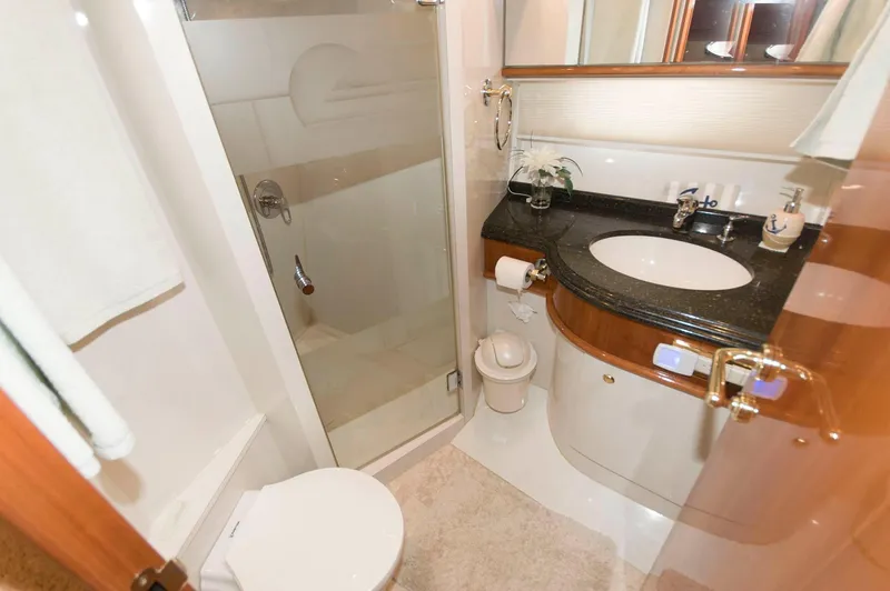 Slide: The Image of Luxurious bathroom in 2001 Neptunus 56 Express yacht with shower and vanity. - 36