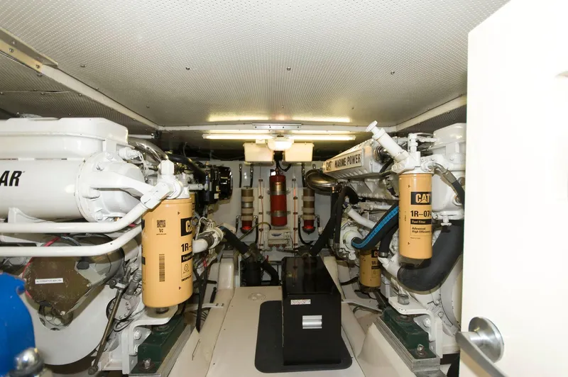 Slide: The Image of Engine room of 2001 Neptunus 56 Express yacht, featuring Caterpillar machinery. - 37
