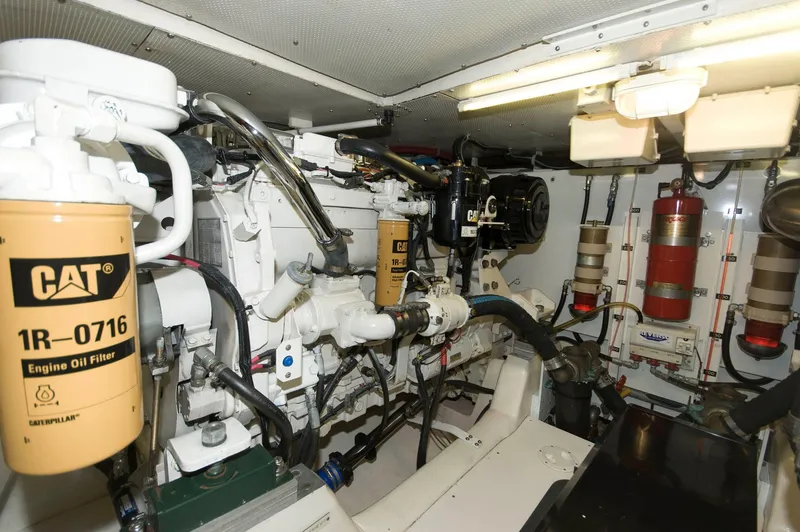 Slide: The Image of Engine room of 2001 Neptunus 56 Express yacht with CAT engine oil filters. - 38