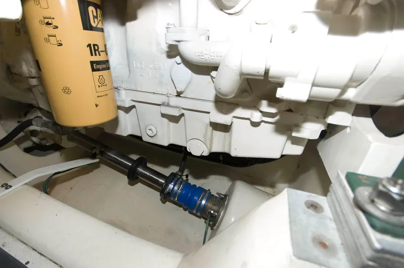 Slide: The Image of Engine compartment of 2001 Neptunus 56 Express yacht, showing mechanical components and filter. - 40