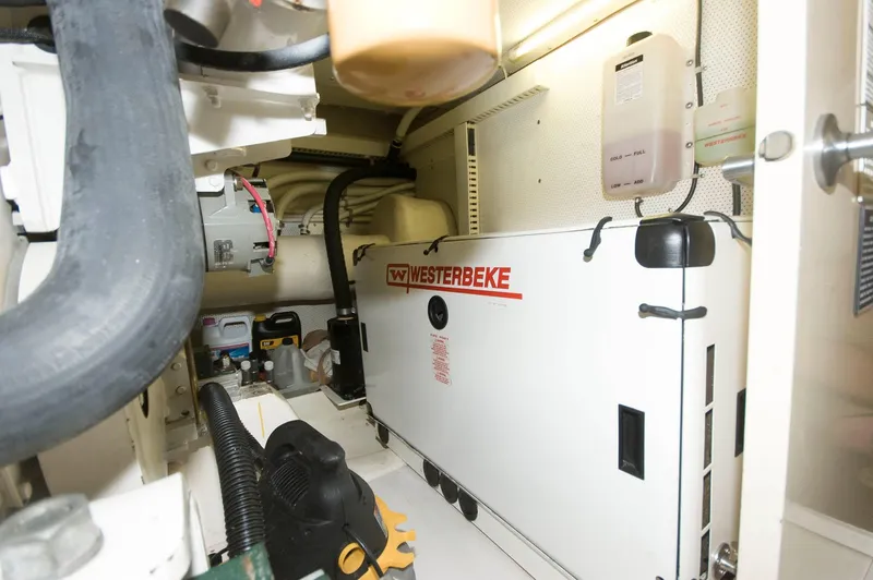 Slide: The Image of Engine room of 2001 Neptunus 56 Express with Westerbeke generator. - 42