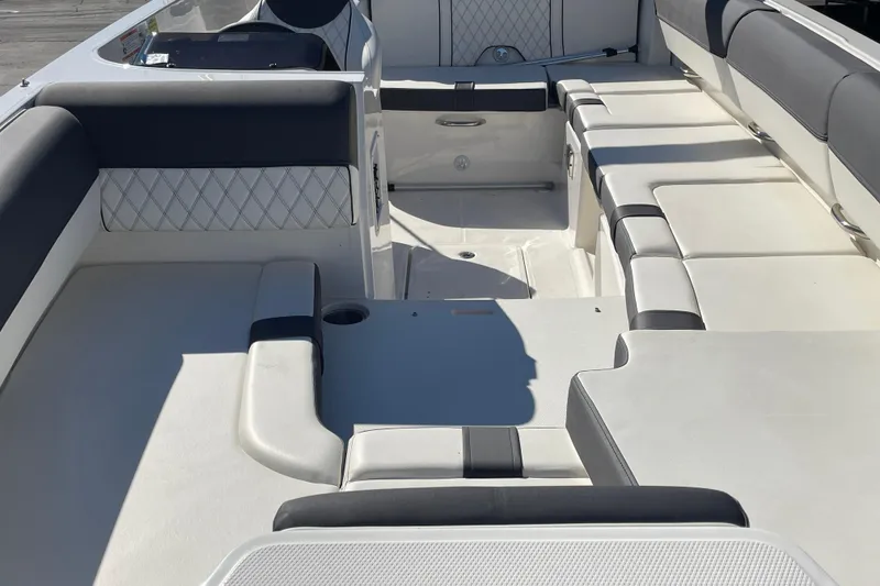 Slide: The Image of 2024 Bayliner DX 2000 boat interior with spacious seating and modern design. - 3