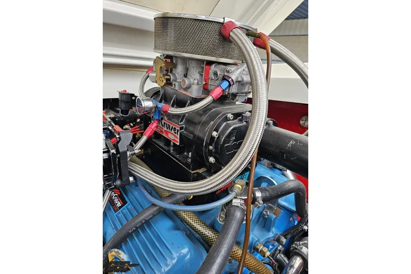 Slide: The Image of Engine of 2001 Wellcraft 33 Scarab AVS with detailed components and wiring. - 100