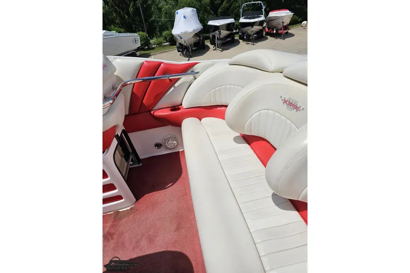 Slide: The Image of Interior of 2001 Wellcraft 33 Scarab AVS with red and white seating. - 49