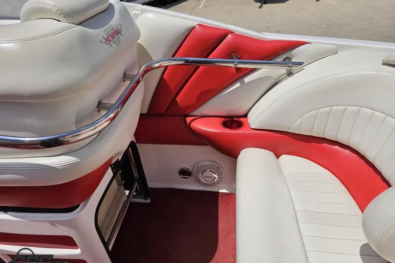 Slide: The Image of Interior of 2001 Wellcraft 33 Scarab AVS boat with red and white seating. - 50