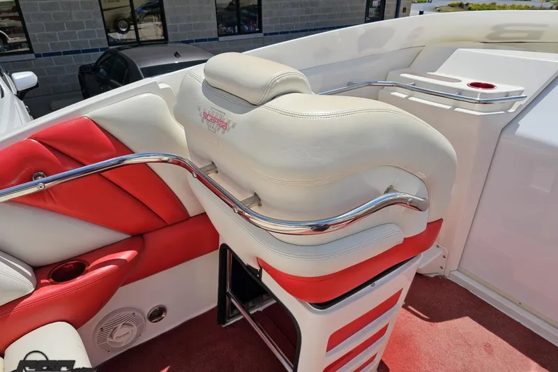 Slide: The Image of 2001 Wellcraft 33 Scarab AVS boat interior with red and white seating. - 54