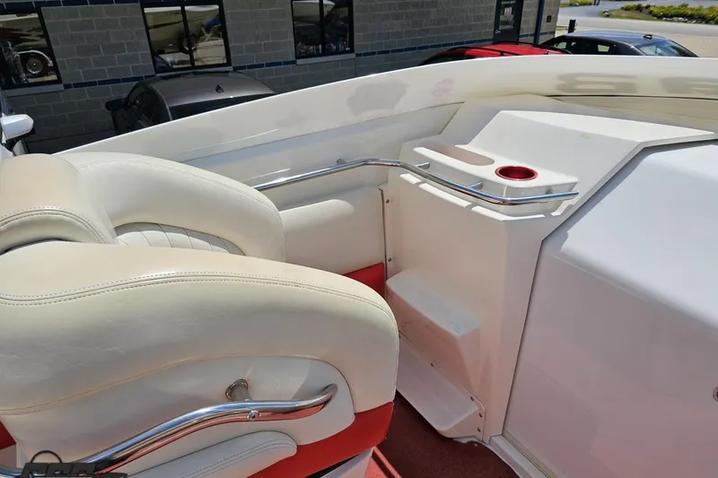 Slide: The Image of 2001 Wellcraft 33 Scarab AVS interior with white seating and red accents. - 55