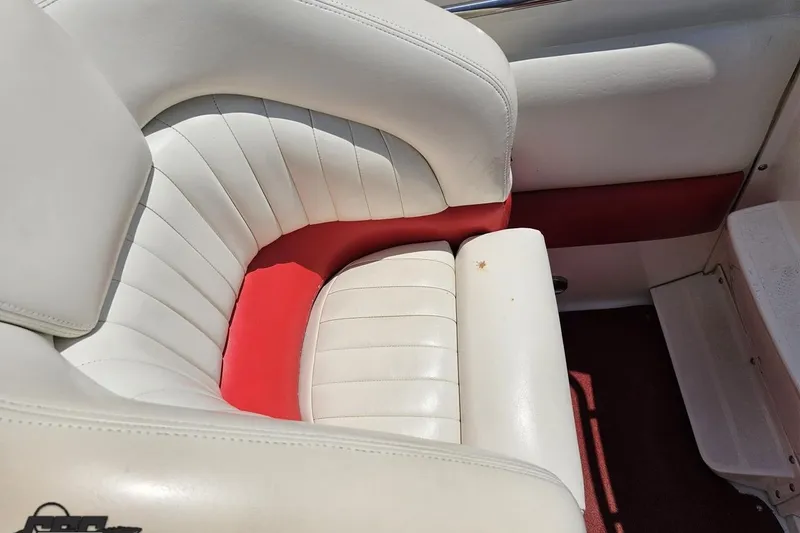 Slide: The Image of White and red leather seating in 2001 Wellcraft 33 Scarab AVS boat. - 57