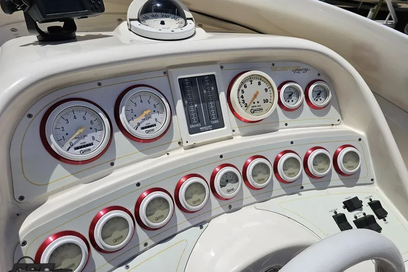 Slide: The Image of Dashboard of 2001 Wellcraft 33 Scarab AVS with gauges and controls. - 62