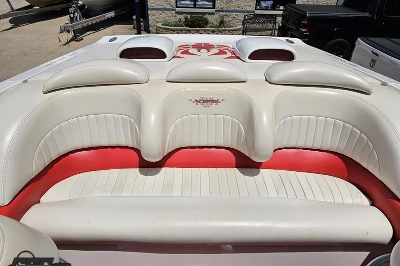 Slide: The Image of 2001 Wellcraft 33 Scarab AVS boat interior with white and red seating. - 87