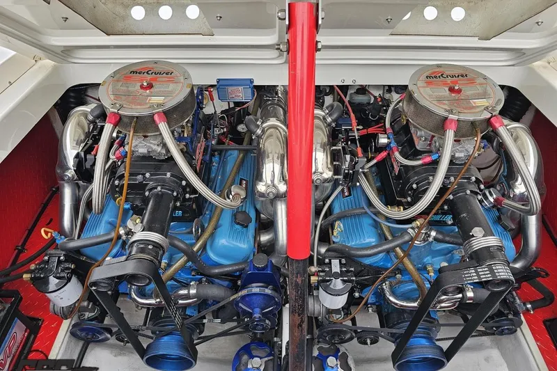 Slide: The Image of Twin MerCruiser engines in a 2001 Wellcraft 33 Scarab AVS boat. - 93